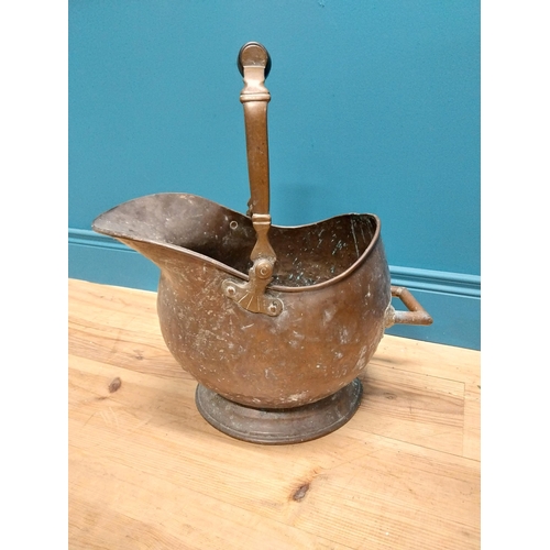 290 - Early 19th C. copper coal helmet with ebony handle {50 cm H x 31 cm W x 48 cm D}.