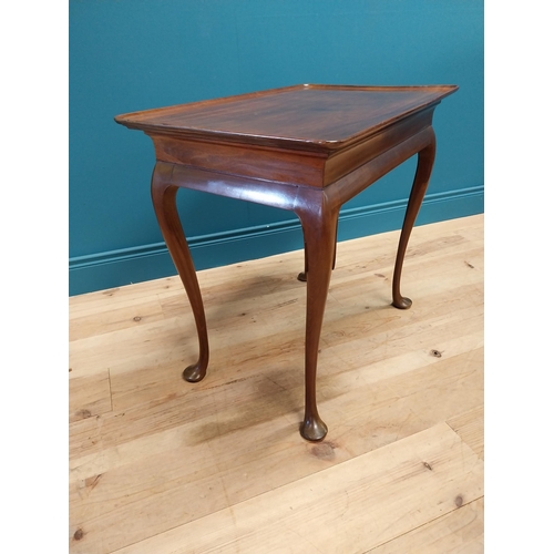 297 - 19th C. Irish mahogany dish top silver table raised on cabriole legs and pad feet {68 cm H x 77 cm W... 