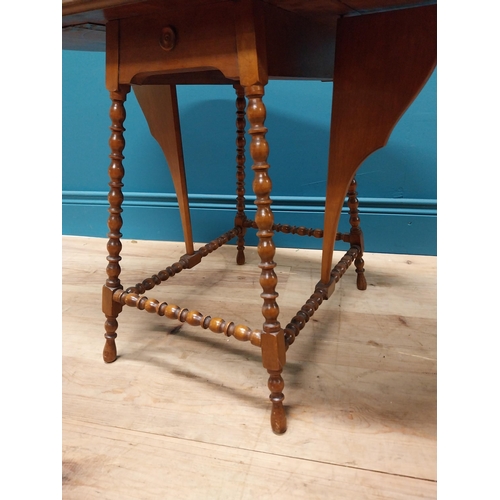 305 - Good quality Edwardian mahogany drop leaf occasional table raised on bobbin legs {52 cm H x 34 cm W ... 