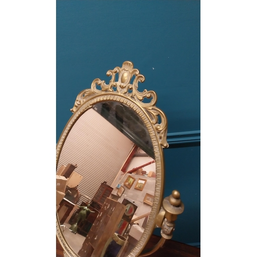 31 - Early 20th C. decorative brass dressing table mirror {70 cm H x 30 cm W x 21 cm D}.