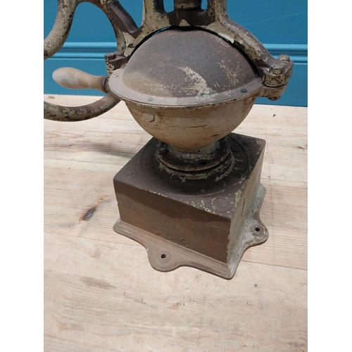 312 - Good quality 19th C. cast iron coffee grinder {50 cm H x 40 cm W x 34 cm D}.