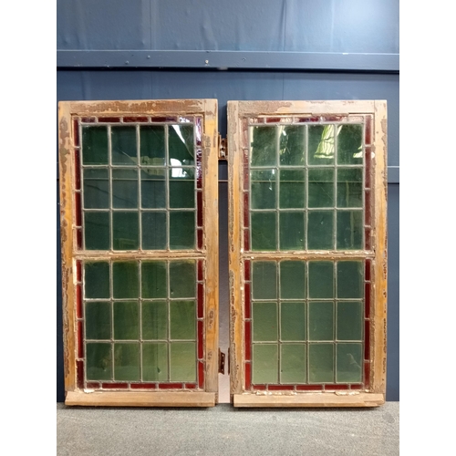 323 - Pair of leaded stain glass windows with brass locks {Each H 98cm x W 50cm x D 3cm }.