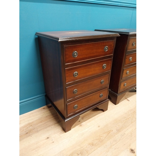 327 - Pair of good quality mahogany and satinwood inlaid bedside cabinets with four drawers raised on brac... 