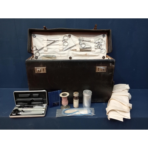 328 - Surgeons bag with instruments {H 27cm x W 46cm x D 14cm }.