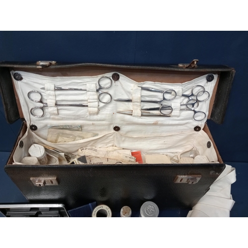 328 - Surgeons bag with instruments {H 27cm x W 46cm x D 14cm }.