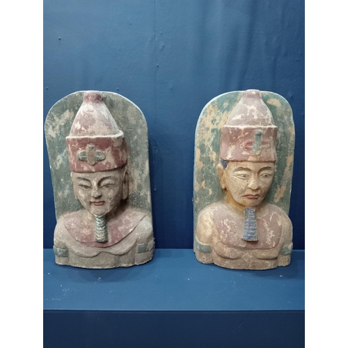 339 - Pair of Mongolian busts {H 50cm x W 30cm x D 12cm}.