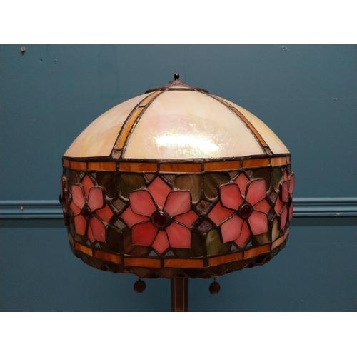 34 - Bronze lamp with leaded glass shade in the Tiffany style {54 cm H x 30 cm Dia.}.