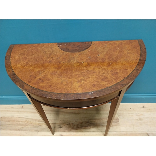 346 - 20th C. burr walnut demi-lune side table raised on square tapered legs in the Georgian style {76 cm ... 