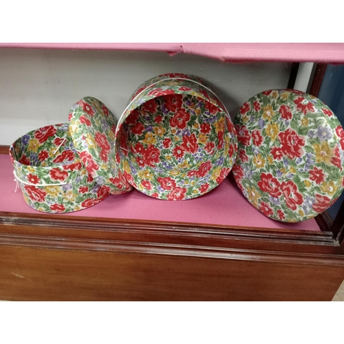 349 - Pair of red rose fabric hat boxes {H 18cm x Dia 30cm H 15cm x Dia 25cm}.