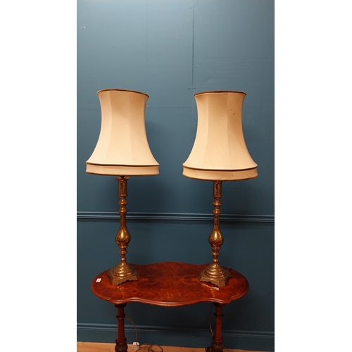 361 - Pair of good quality brass table lamps with cloth shades {104 cm H x 36 cm Dia.}.