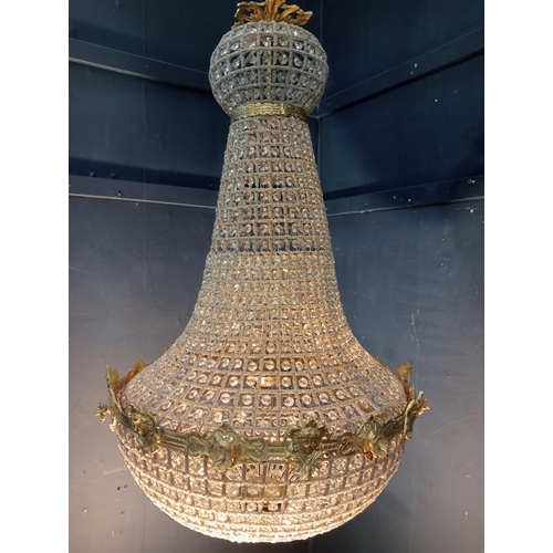 373 - Pear drop crystal and bronze six light chandelier {H 100cm x Dia 60cm}.