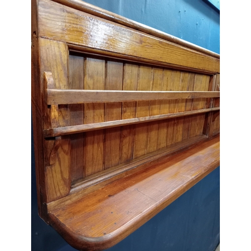 379 - Pitch pine bar back/rack with shelves {H 50cm x W 279cm x D 20cm}.