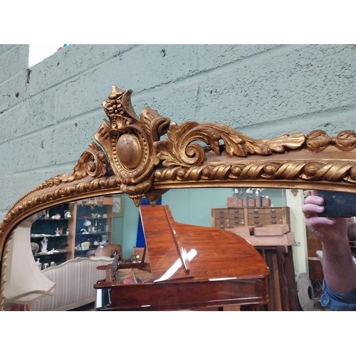 385 - Good quality giltwood overmantle mirror in the Victorian style {104 cm H x 140 cm W}.