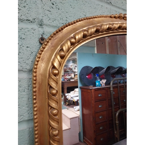 385 - Good quality giltwood overmantle mirror in the Victorian style {104 cm H x 140 cm W}.