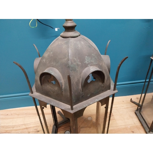 386 - Pair of good quality bronzed metal wall lanterns in the Gothic style {87 cm H x 43 cm W x 48 cm D}.