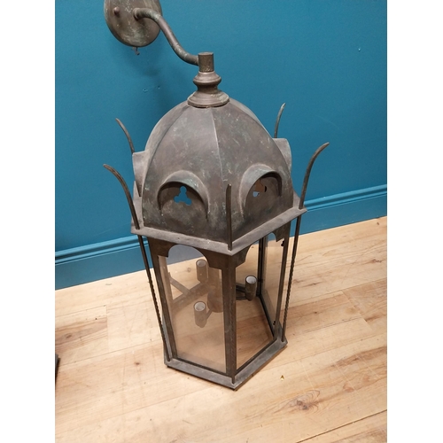 386 - Pair of good quality bronzed metal wall lanterns in the Gothic style {87 cm H x 43 cm W x 48 cm D}.