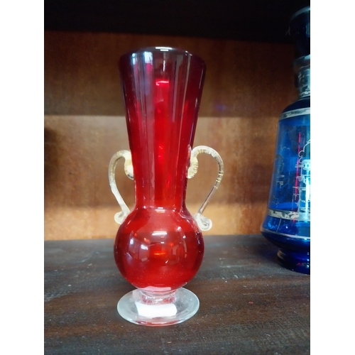 396A - Four glass vases {20 cm H, 19 cm H, 16 cm H and 14 cm H}.