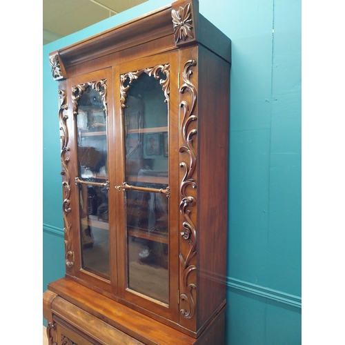 407 - William IV carved mahogany bookcase of neat proportions with two glazed doors over singe drawer over... 