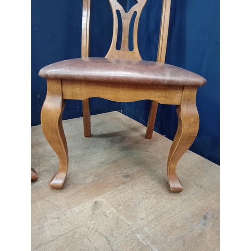 409 - Set of four teak dinning chairs with upholstered seat in the Georgian style {H 104cm x W 50cm x D 48... 