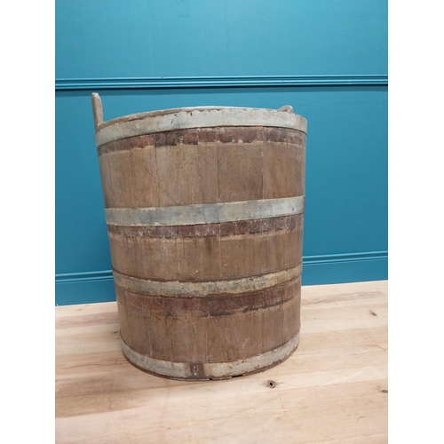 410 - Early 20th C. oak and metal bound log bucket {44 cm H x 84 cm Dia.}.