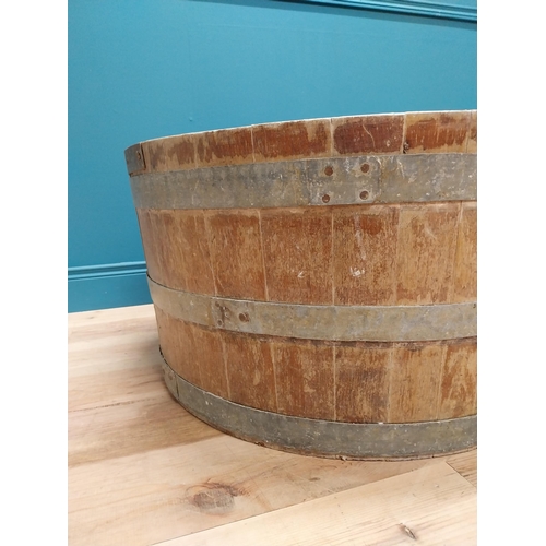 410 - Early 20th C. oak and metal bound log bucket {44 cm H x 84 cm Dia.}.