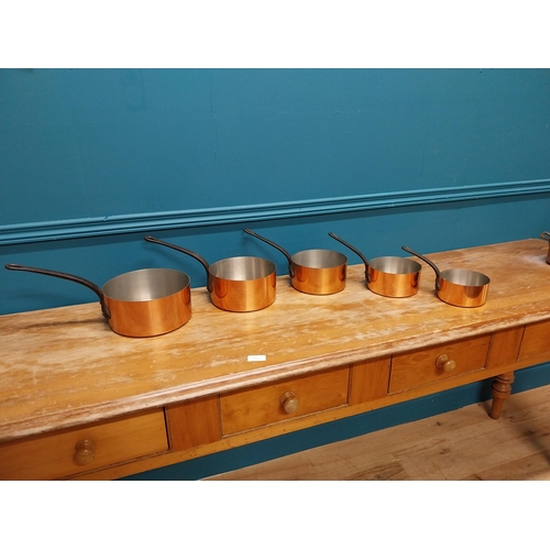 421 - Set of five good quality 20th C. French graduated copper saucepans with wrought iron handles {18 cm ... 