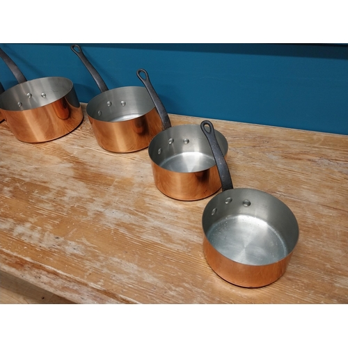 421 - Set of five good quality 20th C. French graduated copper saucepans with wrought iron handles {18 cm ... 