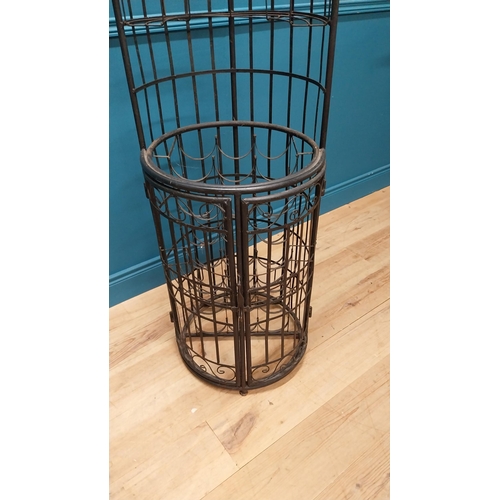 61 - Good quality wrought iron drinks cabinet {160 cm H x 50 cm Dia.}.