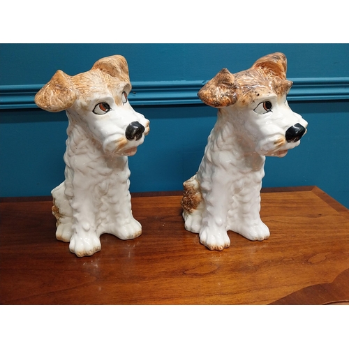 700 - Pair of early 20th C. hand painted ceramic Dogs. {30 cm H x 23 cm W x 16 cm D}.