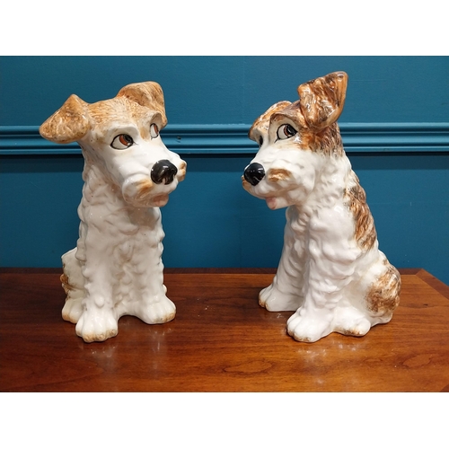 700 - Pair of early 20th C. hand painted ceramic Dogs. {30 cm H x 23 cm W x 16 cm D}.