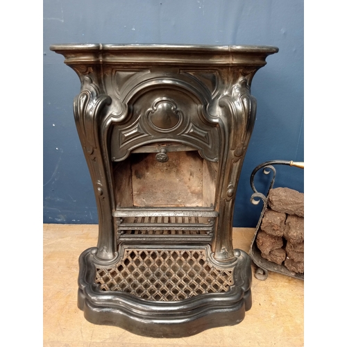 73 - Art deco cast iron stove {H 74cm x W 59cm x D 50cm }.