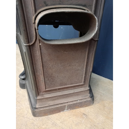 73 - Art deco cast iron stove {H 74cm x W 59cm x D 50cm }.