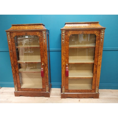 74 - Pair of exceptional quality French burr walnut pier cabinets with ormolu mounts raised on platform b... 