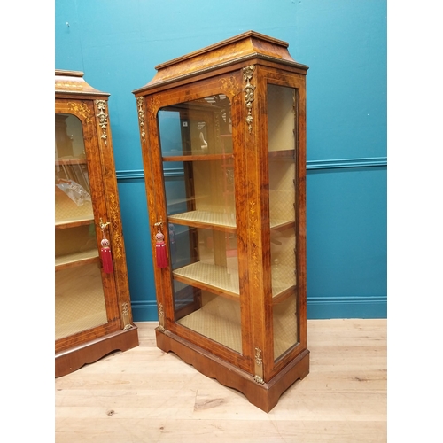 74 - Pair of exceptional quality French burr walnut pier cabinets with ormolu mounts raised on platform b... 