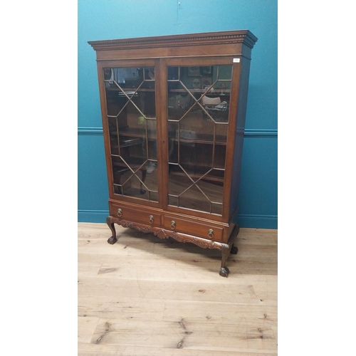 75 - Good quality Edwardian mahogany display cabinet on stand with two astral glazed doors above two shor... 