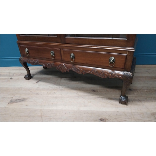 75 - Good quality Edwardian mahogany display cabinet on stand with two astral glazed doors above two shor... 