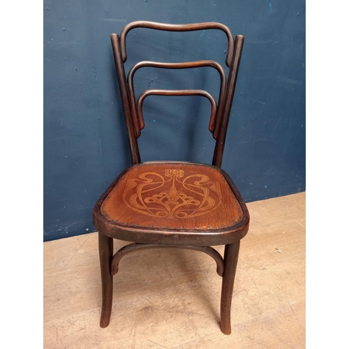 79 - Bentwood side chair with motif seat {H 80cm x W 40cm x D 42cm }.