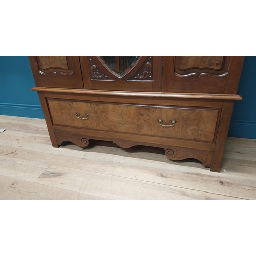 81 - Edwardian carved walnut wardrobe with single mirrored door above long drawer raised on bracket feet ... 