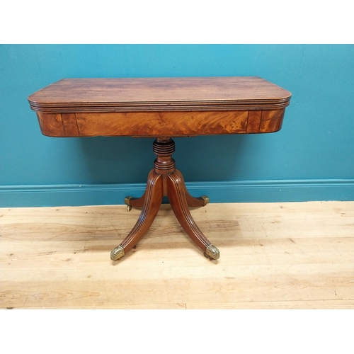 87 - Good quality Regency flamed mahogany turn over leaf card table raised on turned columns, four outswe... 