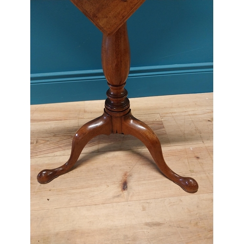 97 - 19th C. mahogany tilt top wine table raised on turned column and three outswept feet {69 cm H x 45 c... 