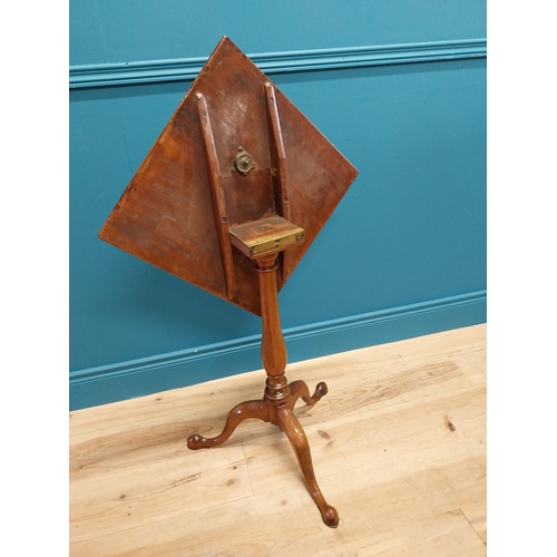 97 - 19th C. mahogany tilt top wine table raised on turned column and three outswept feet {69 cm H x 45 c... 