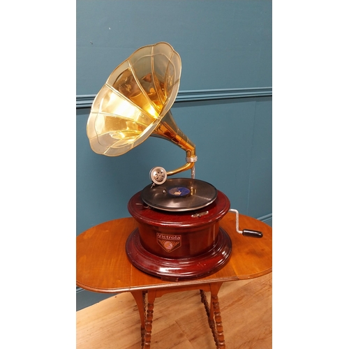 152 - Mahogany gramophone with brass horn {68 cm H x 47 cm W x 60 cm D}.