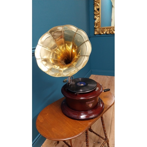 152 - Mahogany gramophone with brass horn {68 cm H x 47 cm W x 60 cm D}.