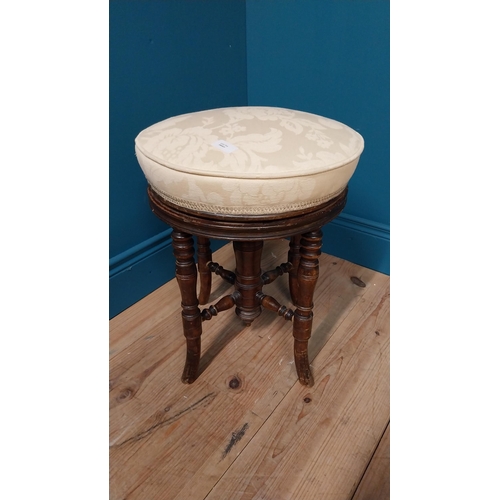 156 - Victorian walnut adjustable piano stool with upholstered seat raised on turned legs {48 cm H x 35 cm... 