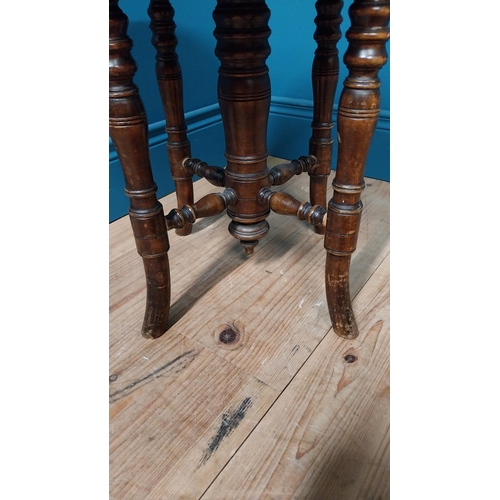 156 - Victorian walnut adjustable piano stool with upholstered seat raised on turned legs {48 cm H x 35 cm... 