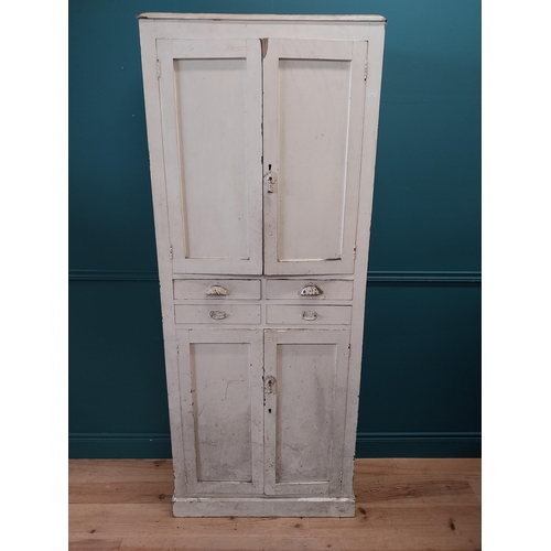 164 - Early 20th C. painted pine kitchen cupboard with four short drawers and four panelled doors {193 cm ... 