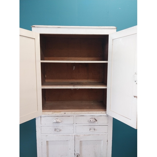 164 - Early 20th C. painted pine kitchen cupboard with four short drawers and four panelled doors {193 cm ... 