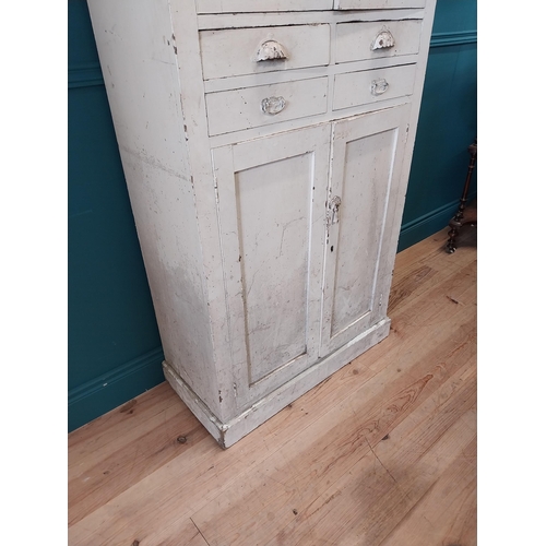 164 - Early 20th C. painted pine kitchen cupboard with four short drawers and four panelled doors {193 cm ... 