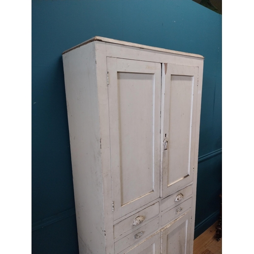 164 - Early 20th C. painted pine kitchen cupboard with four short drawers and four panelled doors {193 cm ... 