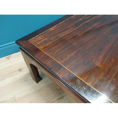 167 - Good quality mahogany and rosewood cross banded coffee table raised on square legs in the Oriental s... 